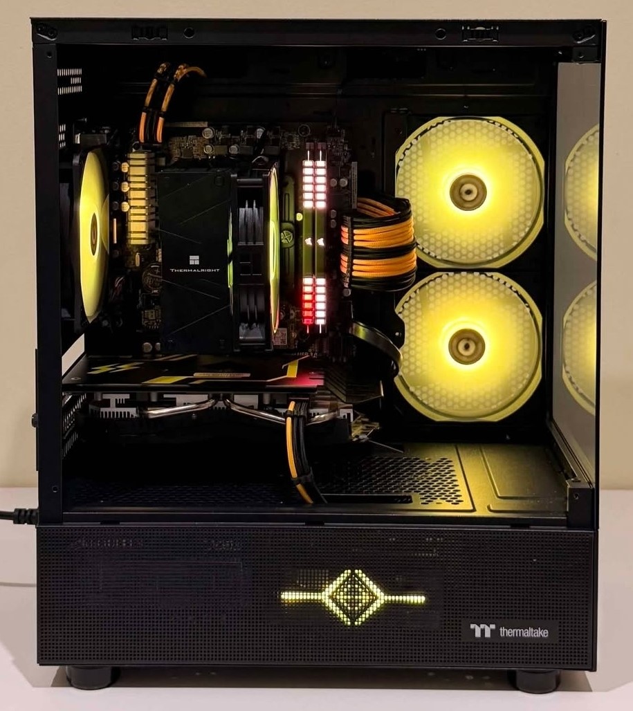 A GeForce RTX graphics card lit up inside a finished build
